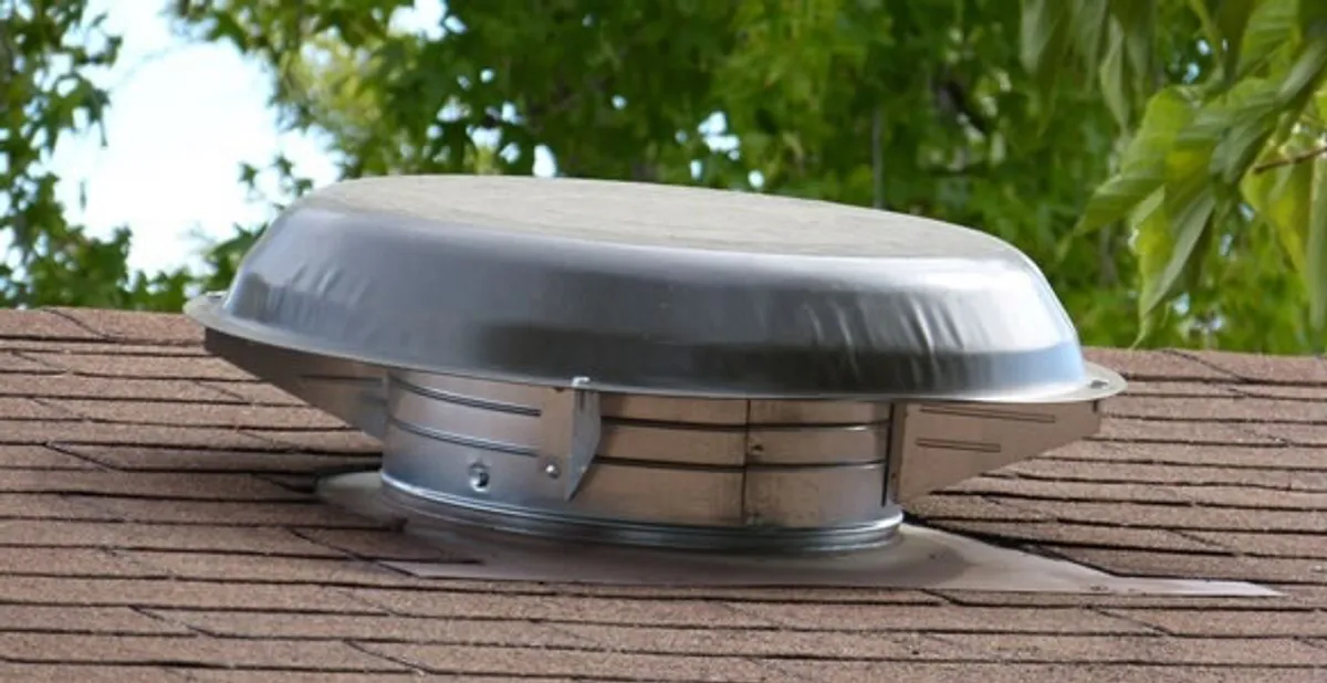 attic fan installation services with low-profile roof ventilation unit in Mountain View, CA
