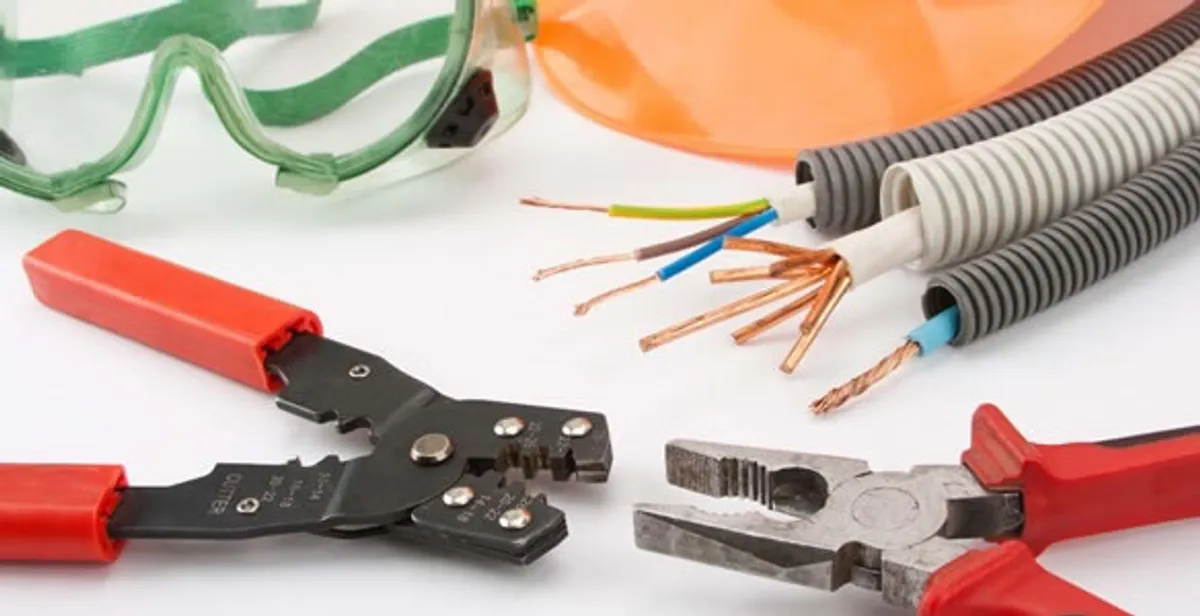 Electrical wiring repair with professional tools and safety equipment in Stanford, CA