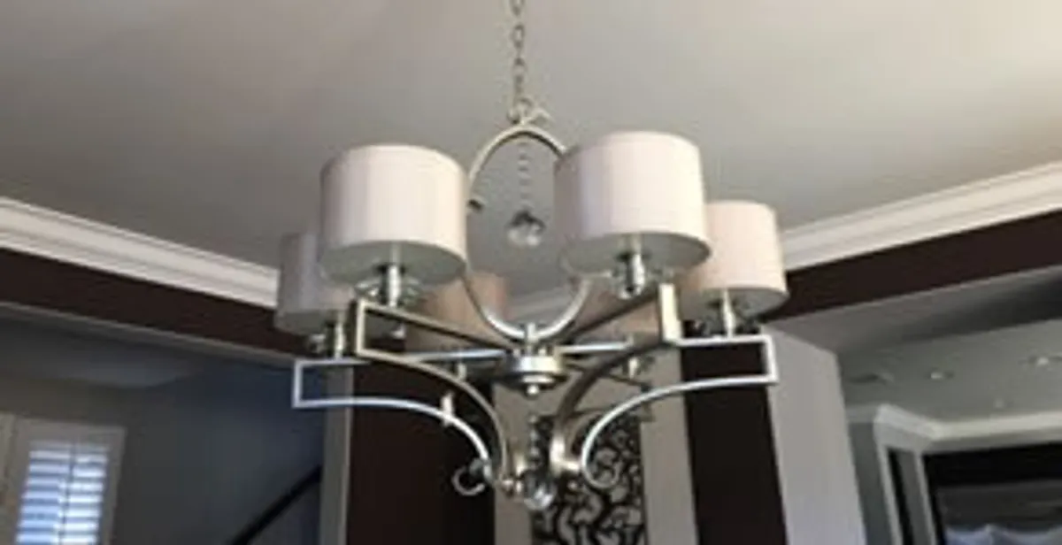 Modern chandelier installation with multiple light fixtures in Mountain View, CA